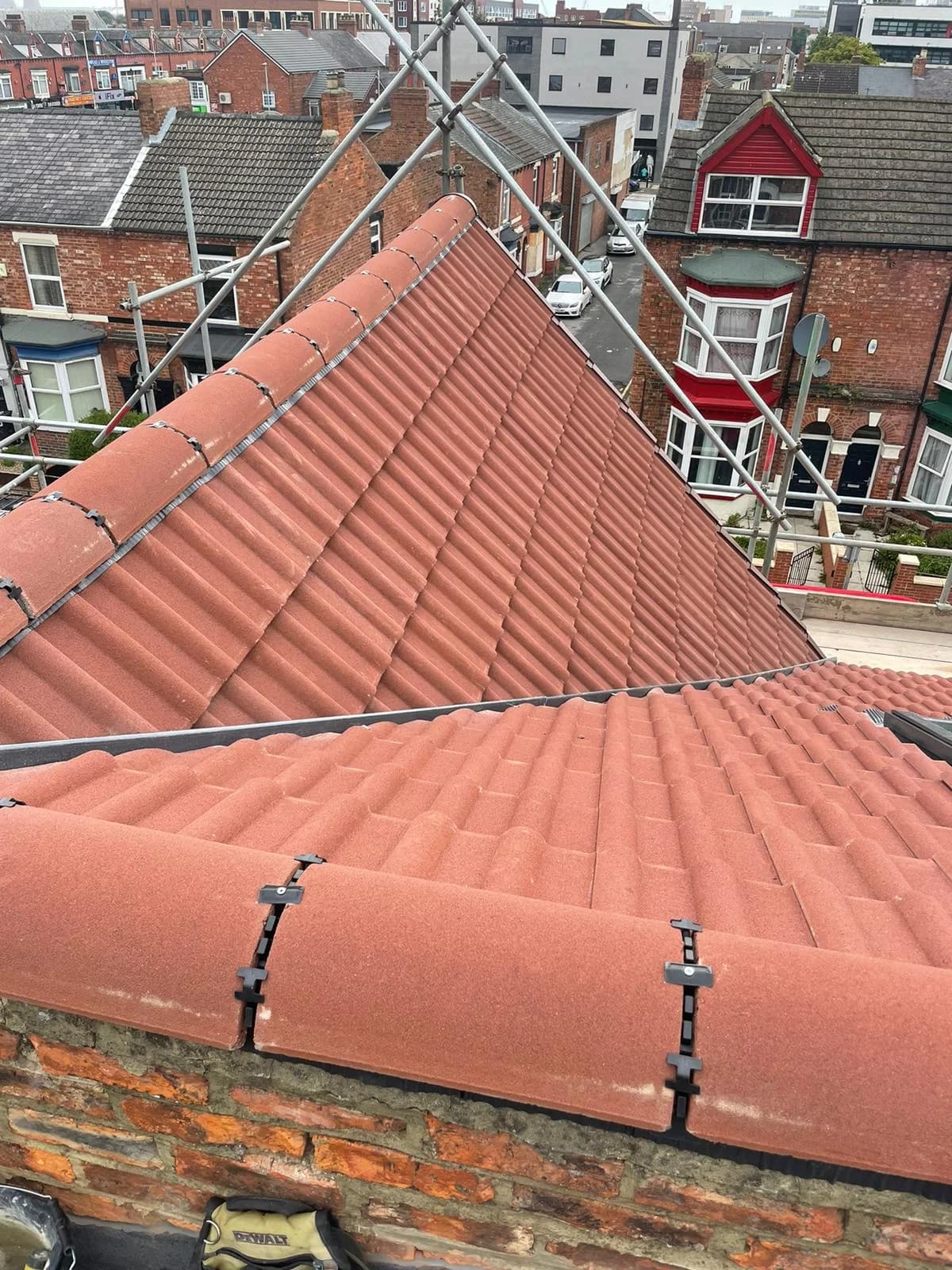 Repaired tiled hip roof on a terrace in the North East